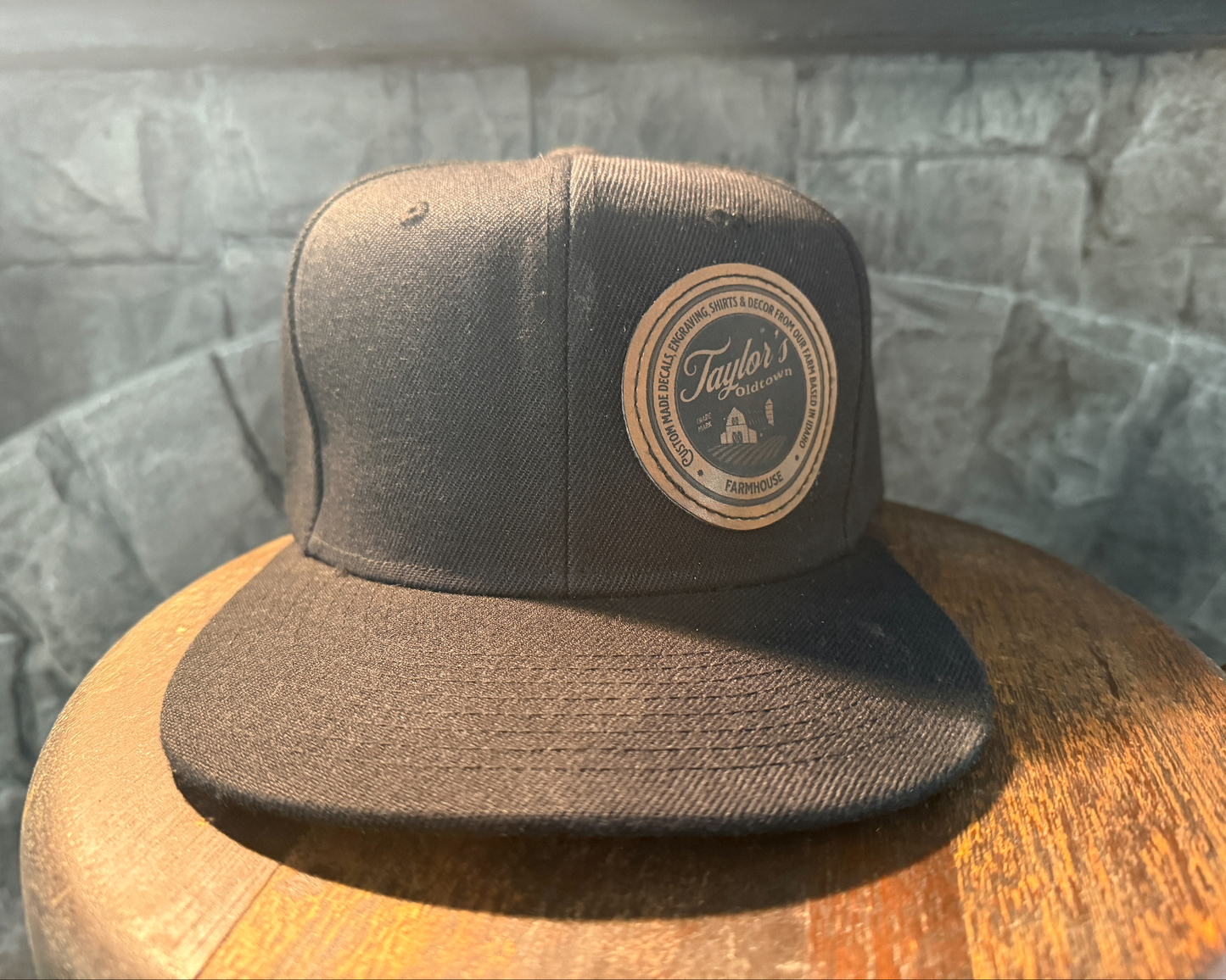 Black Flatbill Snapback Hat with Custom Faux Leather Patch